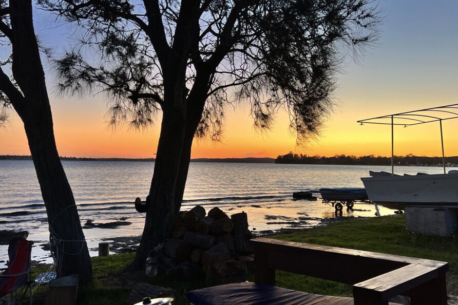 Early evening shot of the outdoor sitting area beside the tree-a few steps away from the lake
