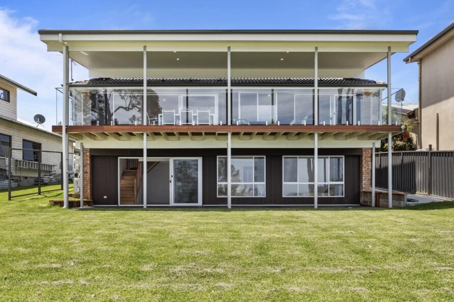 A full lake frontal view of the villa